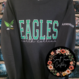 Black crewneck sweatshirt with 'EAGLES' text and logo, featuring 'Small Town Customs' branding.